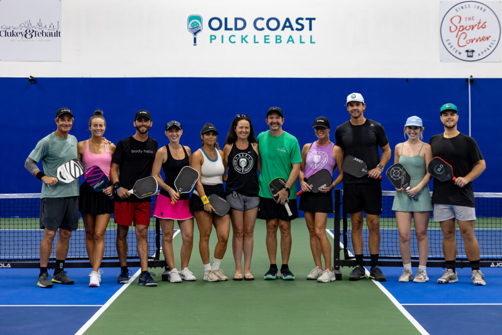 Inside Old Coast Pickleball with group of local players